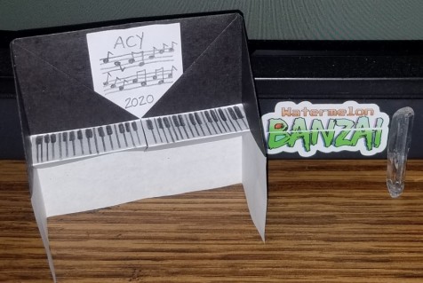 The Completed Origami Piano and Mystical Crystal.